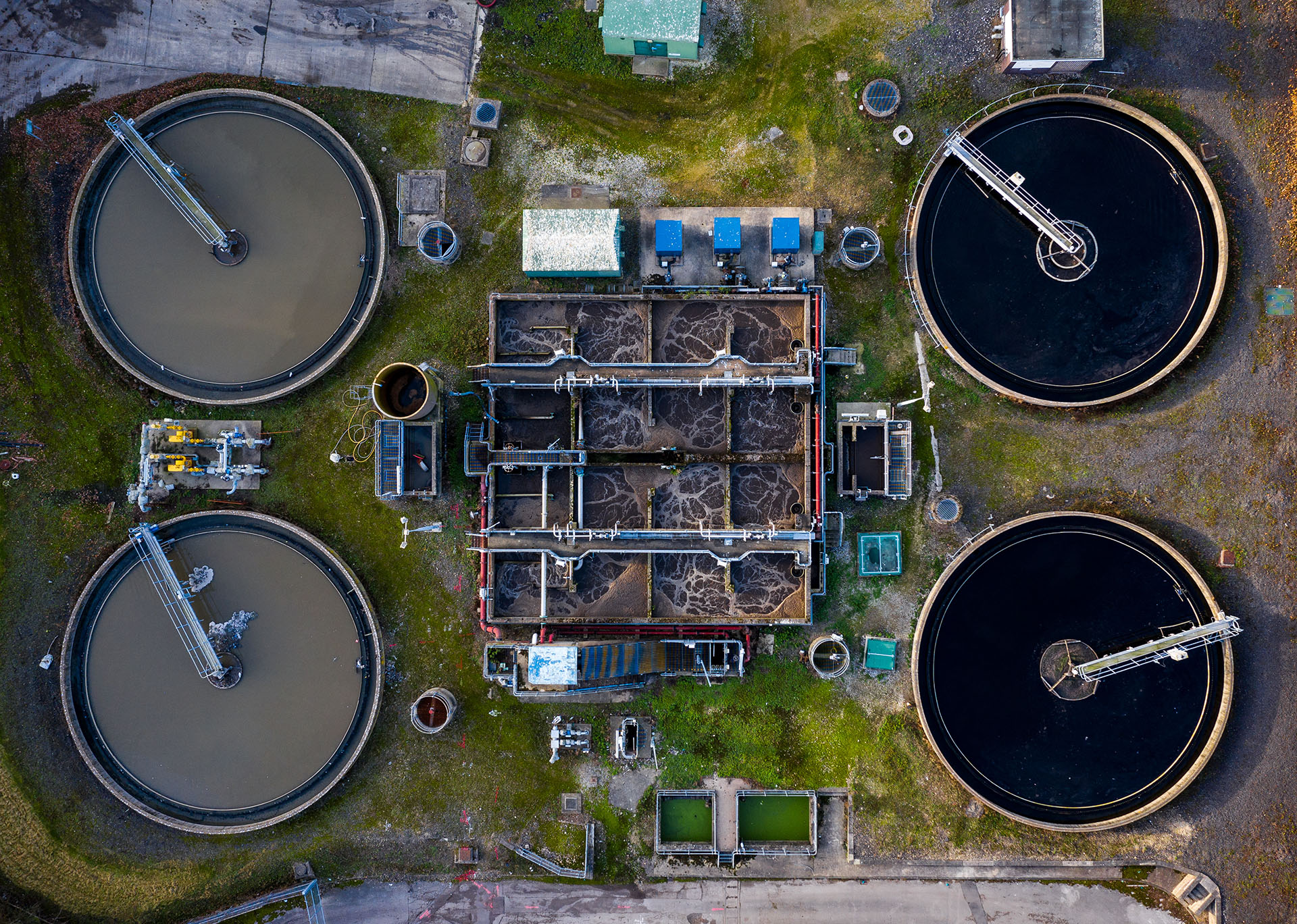 Aerial view of waste water treatment plant with tanks